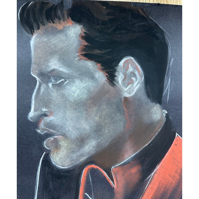 Beautiful man from the fashion industry, this is a pastel drawing on black paper, artist unknown.