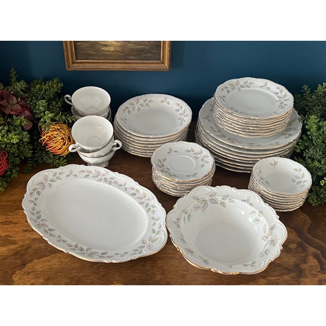 A refined mid-century porcelain dinner service by Mitterteich Bavaria, executed in the elegant and softly romantic...