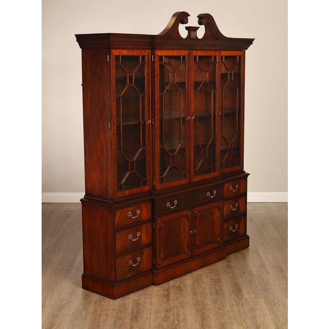High Quality American Made Henkel Harris Flame Mahogany China Cabinet Featuring A Broken Arch Pediment With Central Finial...