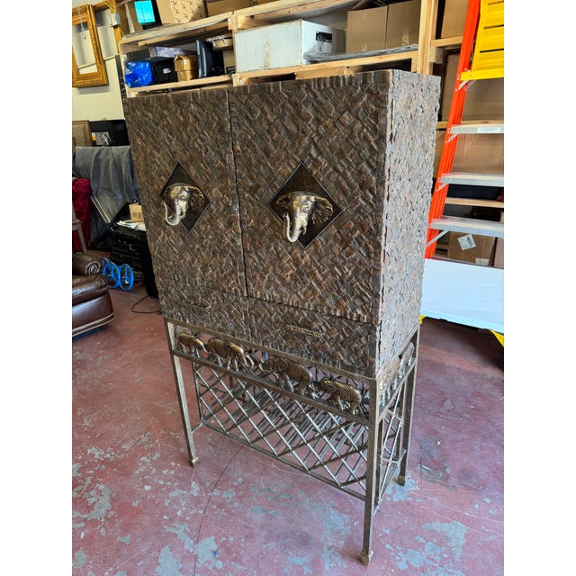 Stunning Maitland-Smith British Colonial Style Bar Cabinet This is a rare, investment-quality piece from the world-...