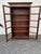 Handsome handmade reclaimed teak cabinet having glass paneled doors with key and 4 interior shelves. Shelves have...