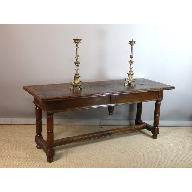 A vintage-style side table in oak with a walnut top. This table shows some visible signs of wear on the top (see photo). A...