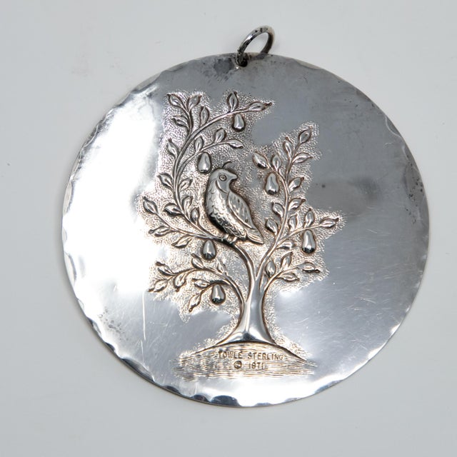 Offering this stunning Towle sterling ornament from 1971. Front depicts a Partridge in a pear tree. Marked under the tree...