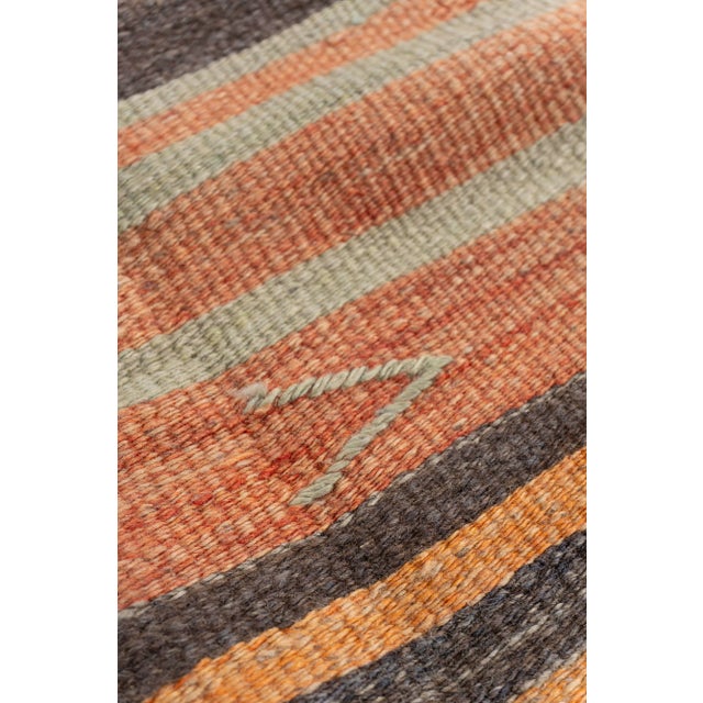 This vintage Turkish flat weave Kilim is hand-woven. The simplicity and boldness of this piece can also give a...