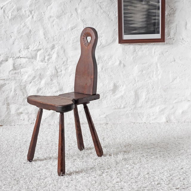 Hand-carved solid wood side chair with a heart-shaped backrest and club-shaped legs. Completely handmade. France, circa...