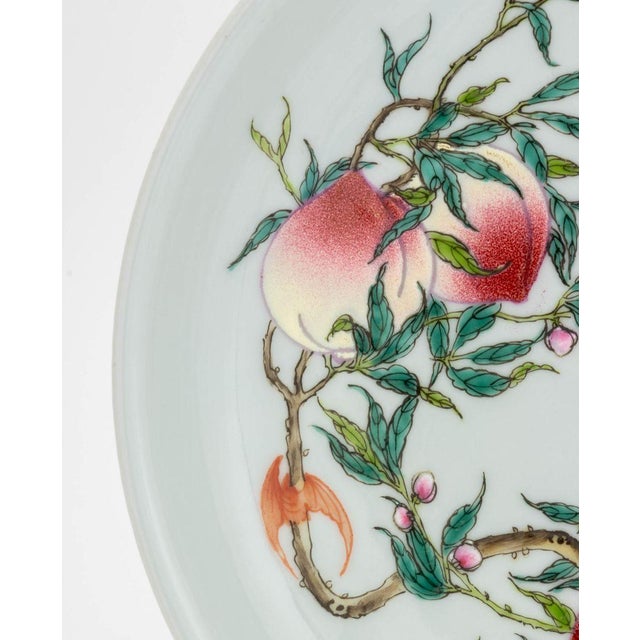 Chinese Famille Rose Porcelain Si Bat and Peach Motif Charger, blue underglaze six character Yongzheng mark within a...