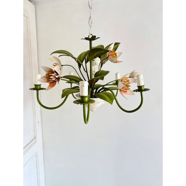 Vintage French painted tole floral chandelier dating from the 1960s. This five-light botanical chandelier features a...