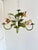 Vintage French painted tole floral chandelier dating from the 1960s. This five-light botanical chandelier features a...