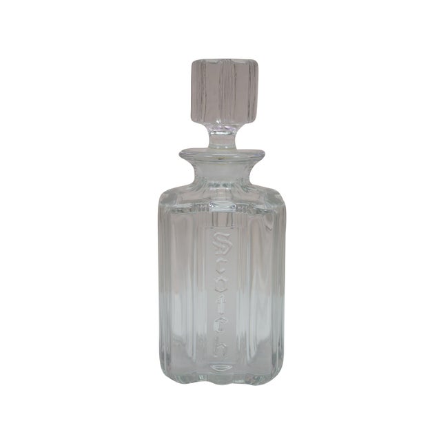 Two circa 1930s-1940s Fostoria Sunray decanters, designed for Scotch and Rye liquors. They feature a distinct striped...