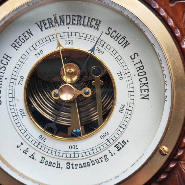 This exquisite antique aneroid barometer is a superb example of early 20th-century precision engineering and European...