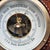 This exquisite antique aneroid barometer is a superb example of early 20th-century precision engineering and European...