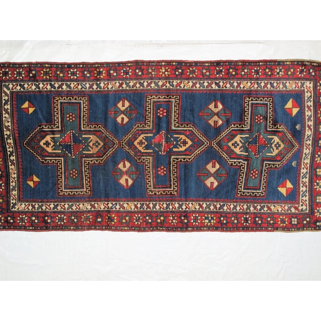This master piece is a wool pile genuine hand woven antique Russian Eagle Kazak rug. Made in the 1900s.