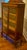 Antique Edwardian /Arts and Crafts oak bookcase dating to approximately 1910–1920; featuring fully intact leaded-glass...