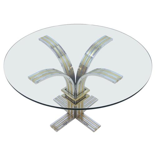 A superb sculptural dining table manufactured by Banci Firenze, Italy, circa 1970. This sophisticated piece features a...