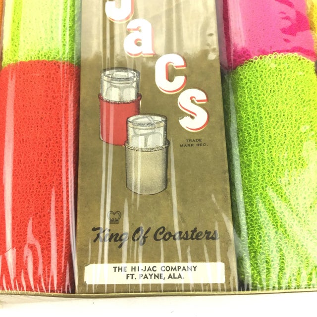 Very unique set of fabric pull over the glass coasters. Bright colors of orange, yellow, Hot pink, bright green, and red....