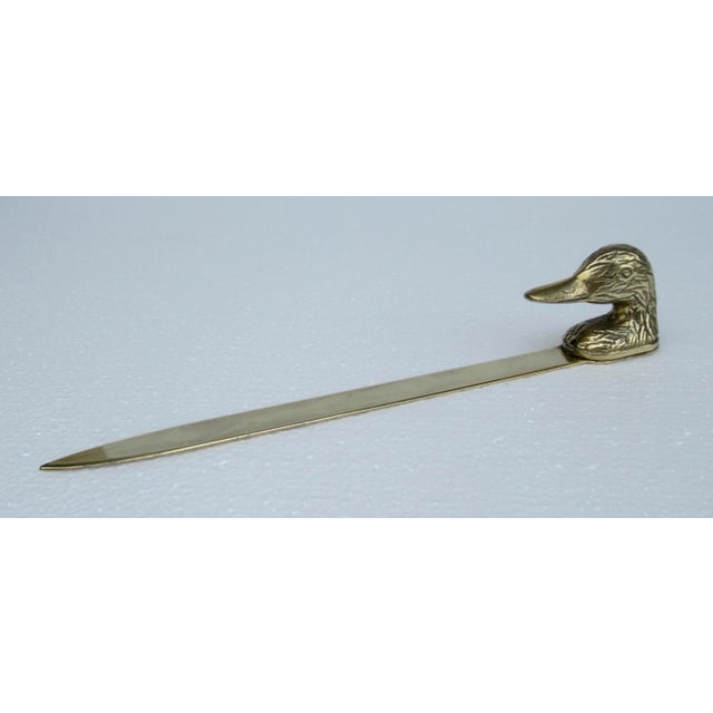 Vintage; Mid-century brass mallard duck letter opener. Maker's mark sticker is indiscernible, and half gone, presumably,...