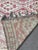 Vintage Red Moroccan Rug | Handwoven Berber Wool Rug with Diamond Lattice Pattern This striking vintage Moroccan rug...