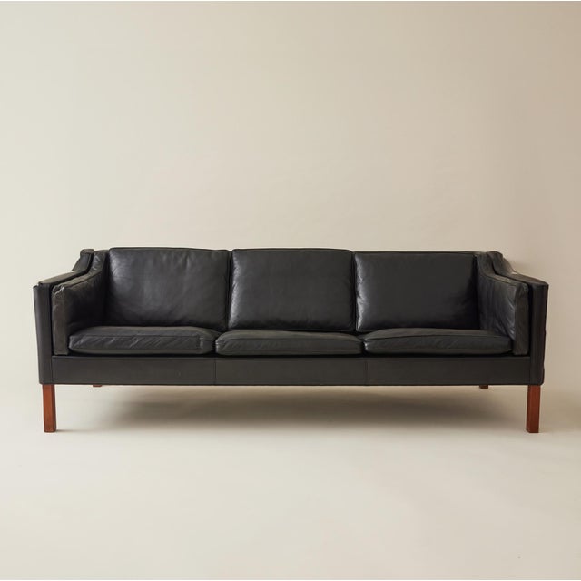 Danish designer Borge Mogensen originally designed the 2213 sofa for his own home in 1962. Today, the sofa is probably the...