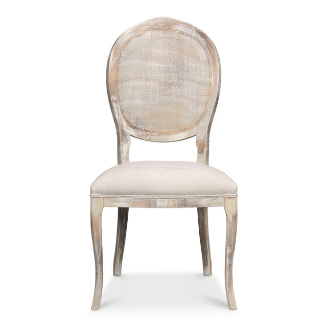 Cabriole legs curve outward at the knee and taper to small pad feet in the Louis XV manner. Above them an oval of open...