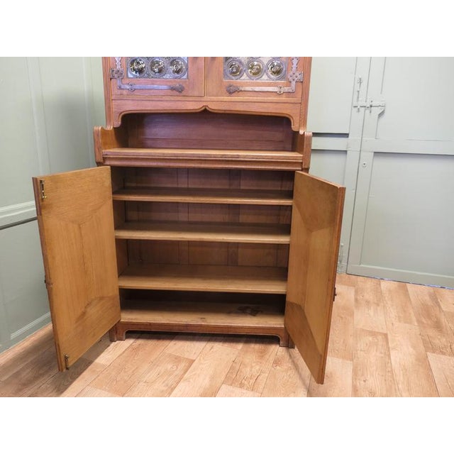 Golden Oak Arts and Crafts Dresser / Sideboard Designed for Liberty This handsome piece, dating from the early 20th...