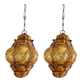 Pair Vintage Mid 20th Century Amber Glass Caged Pendant Lights For Sale