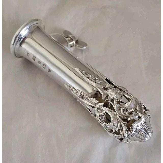 A fine sterling silver posy holder by Hugh Crawshaw, fully hallmarked in Sheffield for 2004. Designed for holding a small...
