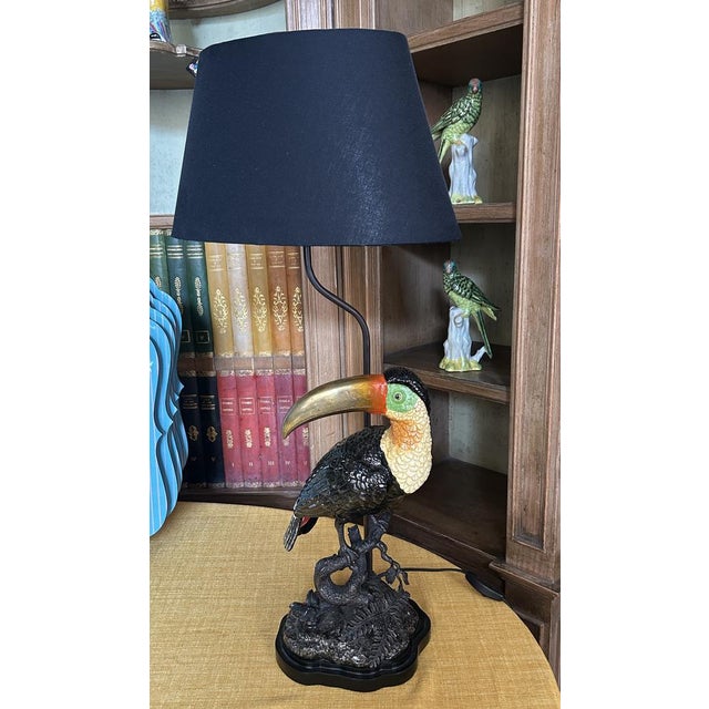Toucan Lamp in Bronze and Porcelain with Oval Lampshade by Gand & C, in New conditions. Designed from 2000 Stamped by...