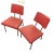Pair of hip vintage mid century lounge chairs. Brick Red vinyl with black metal accents. Back legs are hairpin style. Low...