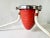 A 1930s Machine Age Christmas tree stand in Art Deco Streamline style. The stand features a red and chrome bullet-form...