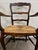 Early 20th Century Antique French Country Style Louis XV Style Ladder Back Rush Seat Arm Chairs For Sale - Image 5 of 10