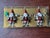 Set of three whimsical Santa Claus ornaments by Mackenzie Childs. These metal ornaments are brand new in the original...