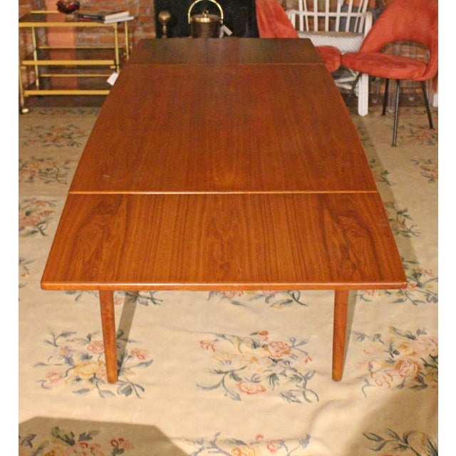 Circa 1960s Mid Century Modern expanding dining table by AS Randers, Denmark. Presumably designed by Harry Ostergaard....