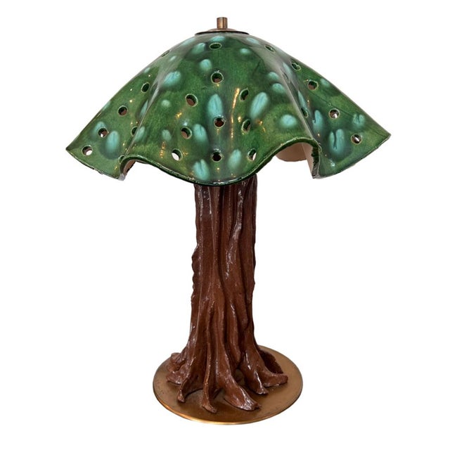 A delightful decorative table lamp designed in the shape of a small tree. It was made in France in the 1960s. The top is...