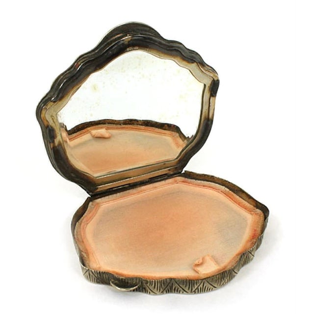 This exquisite Silver 800 Hand-Painted Porcelain Powder Compact is a charming and beautifully crafted antique vanity...