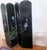 This black lacquered 4 panel Early 20th Century Chinoiserie screen is hand painted to depict a Chinese village and it's...
