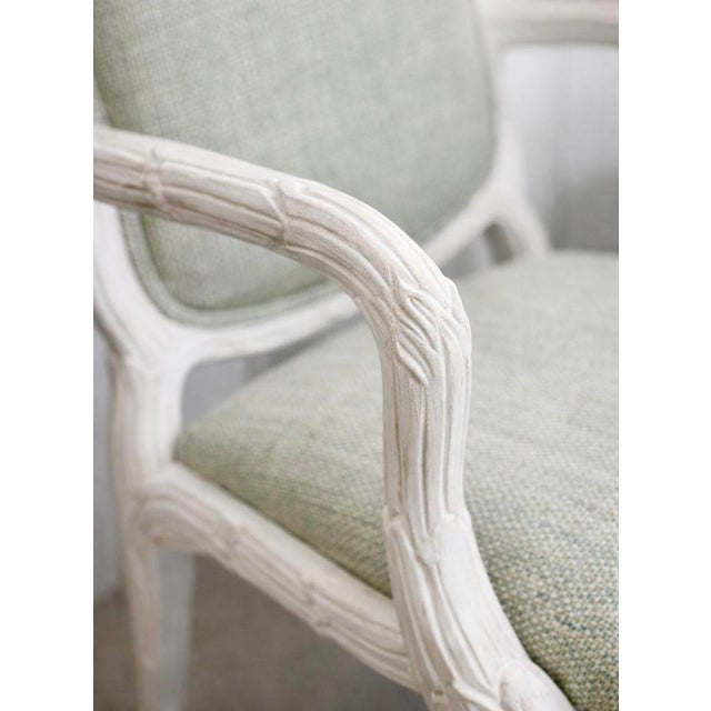 These Acanthus Chairs reimagined in a matte white finish and newly upholstered in a subtle green fabric. The set includes...
