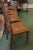 This is an awesome set of antique oak chairs. They look European, probably English. Solid & very sturdy. Barley twist...