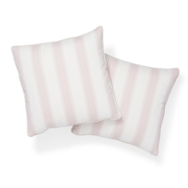 This 20" x 20" pillow features Rafe Stripe in Quiet Pink. A soft blend of cotton and linen, this woven stripe is the...