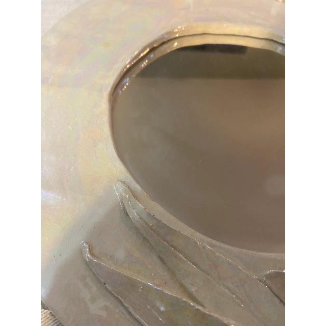 Vintage Calla Lily lustreware ceramic mirror. Signed Hand made iridescent ceramic mirror with sculpted calla lily flowers....