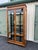 Chinoiserie style Chin Hua display cabinet by Raymond Sobota for Century Furniture. A beautiful burlwood frame encases...