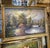 Bring the peaceful beauty of the countryside into your home with this charming landscape painting depicting a tranquil...