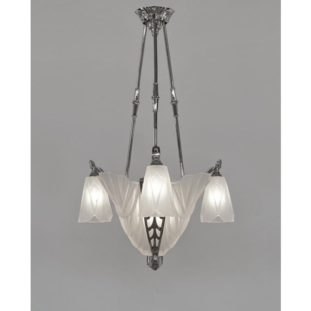 Jamain & Degué A beautiful French 1930 art deco chandelier in nickel plated solid brass or bronze by Célestin Jamain...