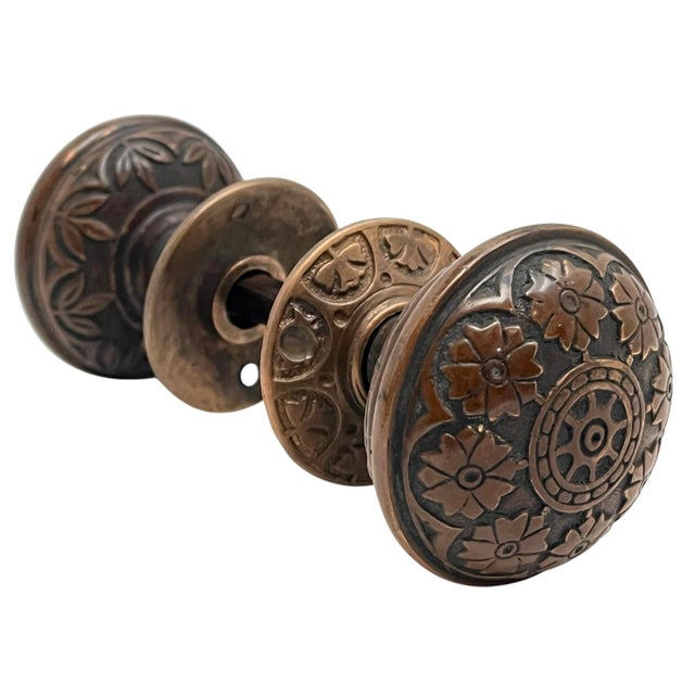 Add an impressive touch of quality American hardware to your favorite door with this complete set of ornate bronze...
