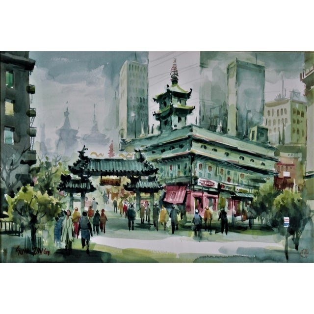 This artwork titled "Chinatown, San Francisco" c.1975 is a watercolor on paper by noted Chinese/American artist Sun Ying,...