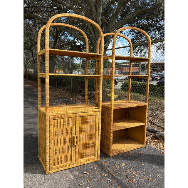A rare matched pair of vintage burnt woven bamboo etageres featuring dramatic double arch architecture and tiered open...