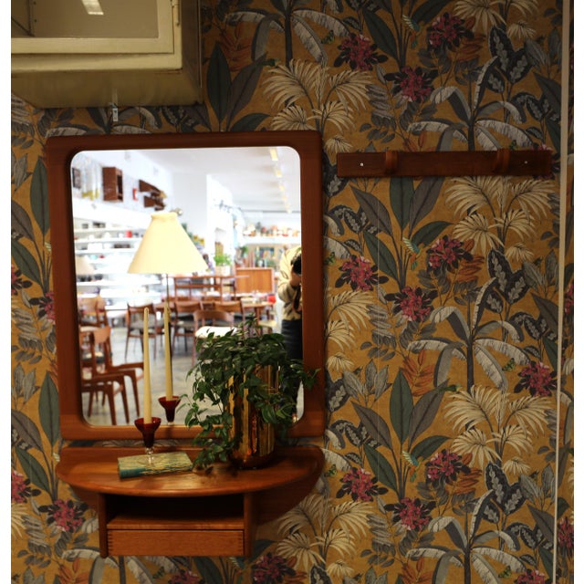 **A beautiful welcome – Danish teak hall set with mirror, wall console and hook strip** An elegant Danish hall set in...