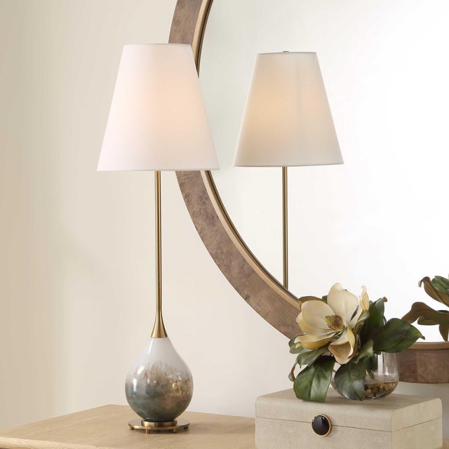 Gloss White Glass Featuring Metallic Smoked Bronze Hues Accented With Antique Brass Plated Details. A Tapered Round...