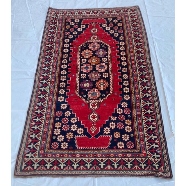 Antique Shahnazari Shirvan rug, Azerbaijan, circa 1870, hand-knotted in wool with a geometric central medallion...