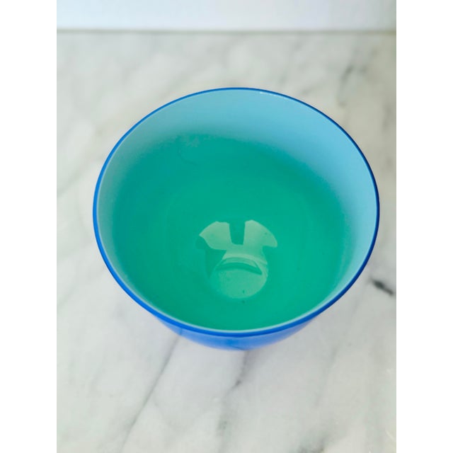 This stunning bicolored glass bowl was purchased in Germany and appears to be signed. Unfortunately, the letters are...