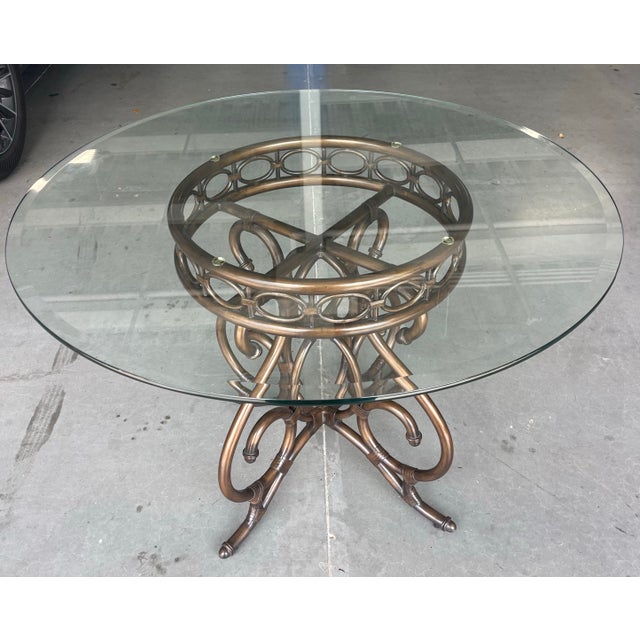 Vintage Lexington Tommy Bahama Landara bistro table featuring an intricately sculpted leather-wrapped metal base with...